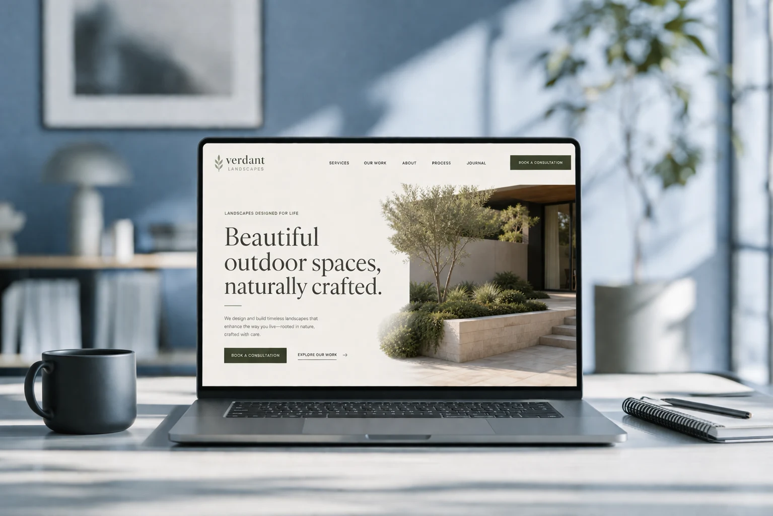 Premium website mockup shown on a laptop at a construction workspace